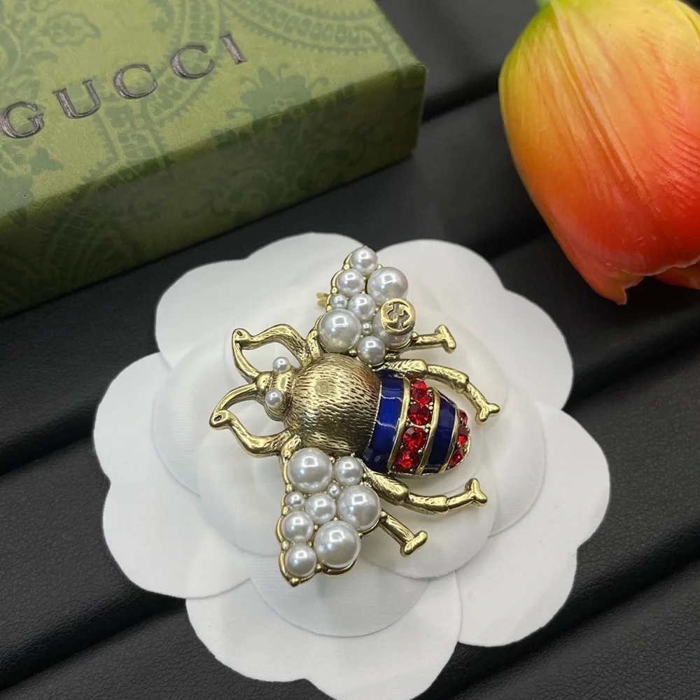Gucci Gold-Tone Bee Brooch with Pearls and Red & Blue Enamel